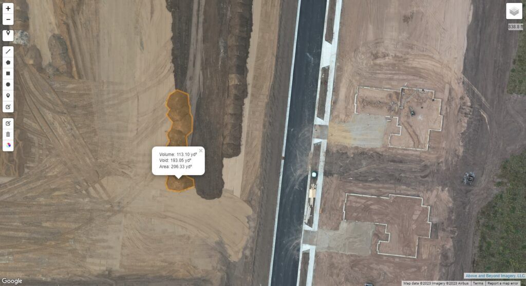 Drone mapping service of a construction site. Image shows volumetric measurements being taken of dirt pile; quick, easy, and accurate. By drone service provider Above and Beyond Imagery, Hudson Wisconsin.